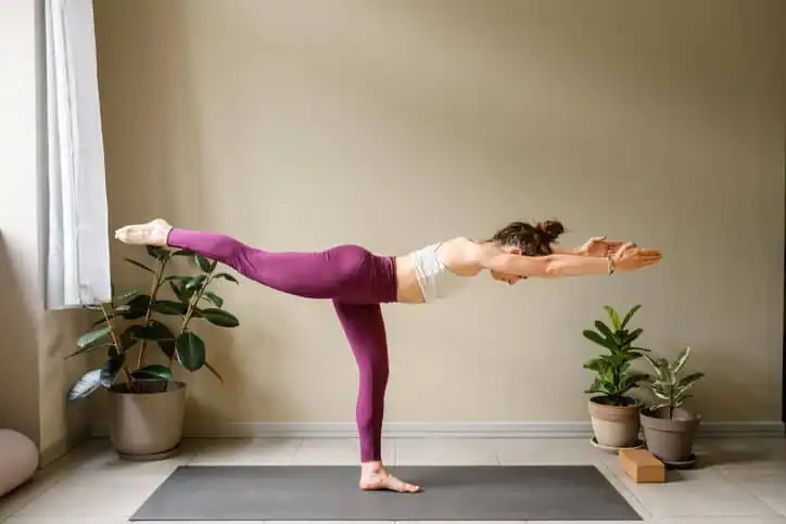 Achieving the Perfect Tone: How Often Should You Exercise for Results? 1 Woman doing Yoga exercise Buckinghamshire to help with toning the body.