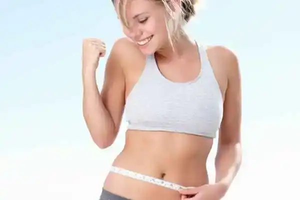 Unraveling the Mystery: Where Does the Body Fat Loss From First? 3 Image of woman happy with fat loss Buckinghamshire